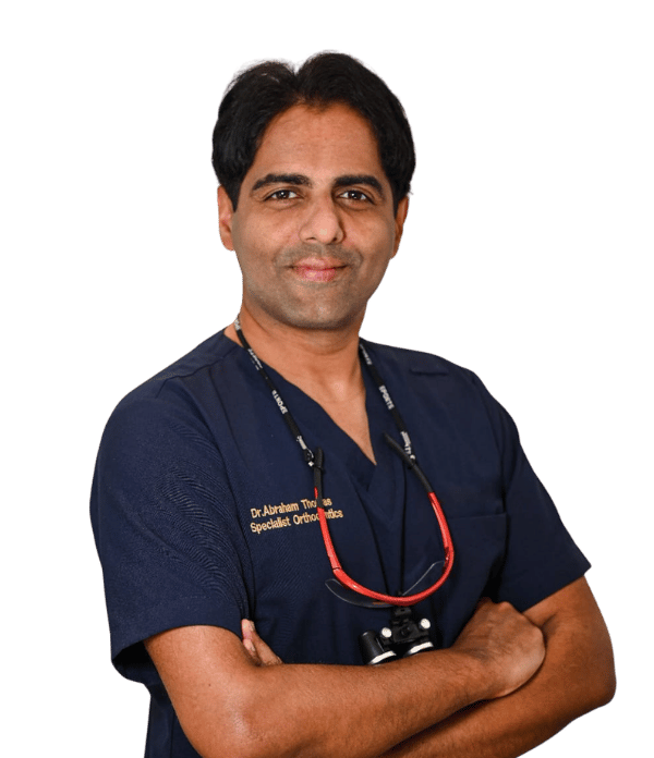 Dr. Abraham Thomas, Specialist Orthodontist at Kids & Family Dental Clinics Sharjah